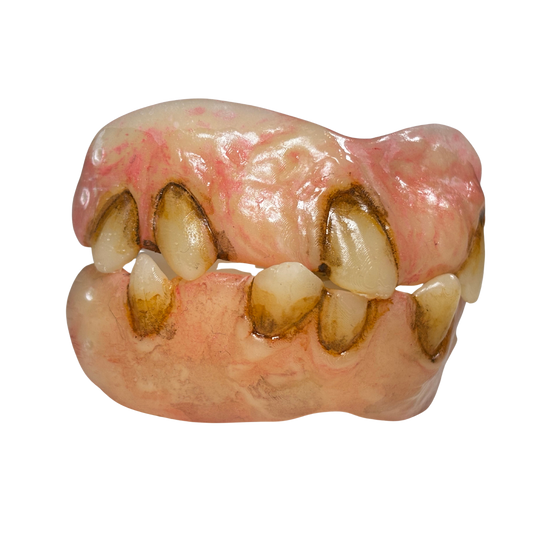 Monster teeth prosthetic with uneven decayed character design and comfort fit