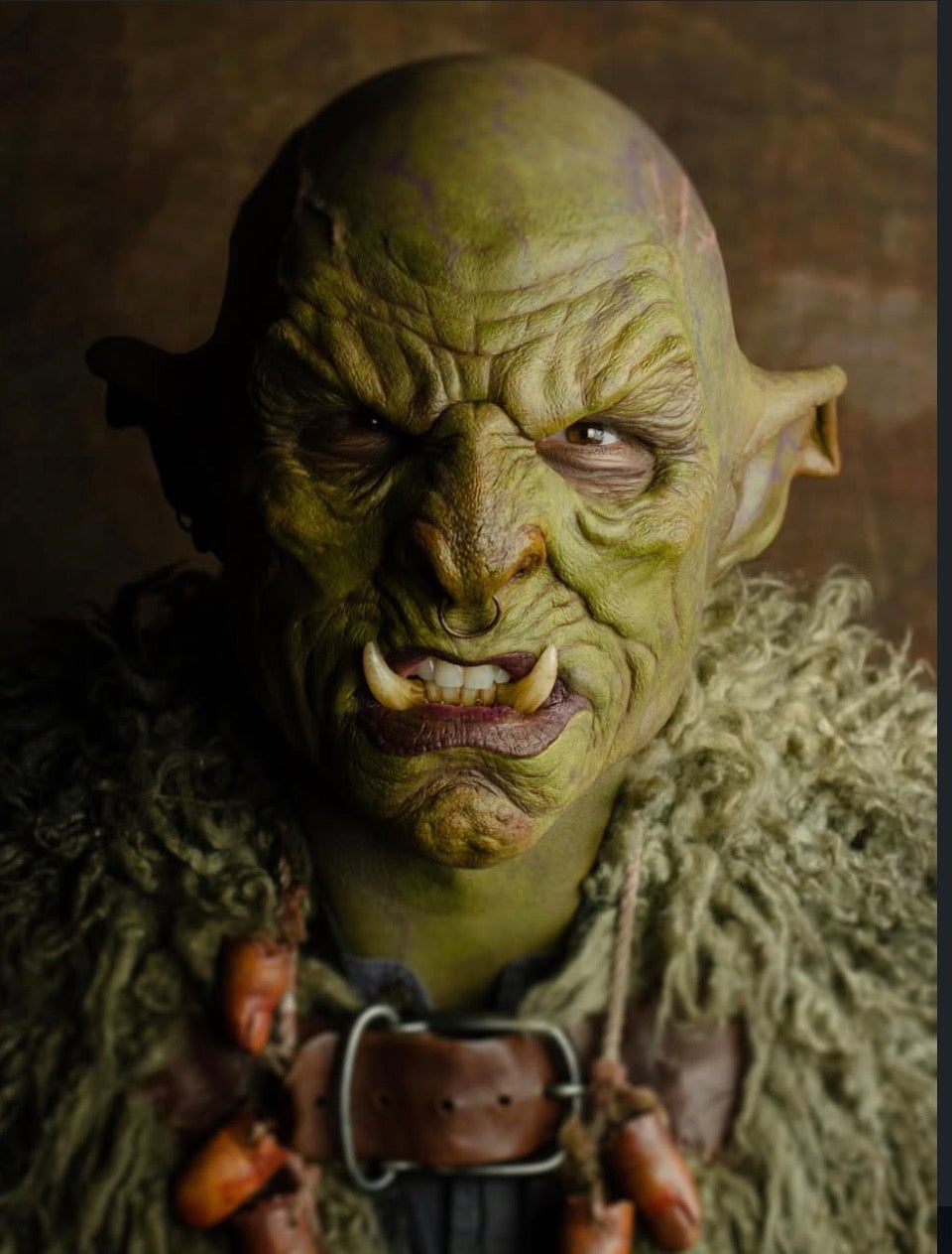 Monster tusk teeth worn in orc goblin creature cosplay with extended curved tusks